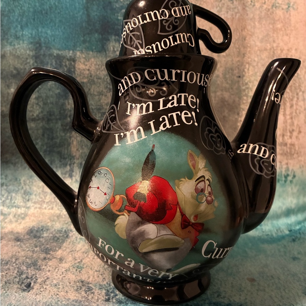 Disney Alice in Wonderland retired design Teapot with 1 Cup and 2 Saucers